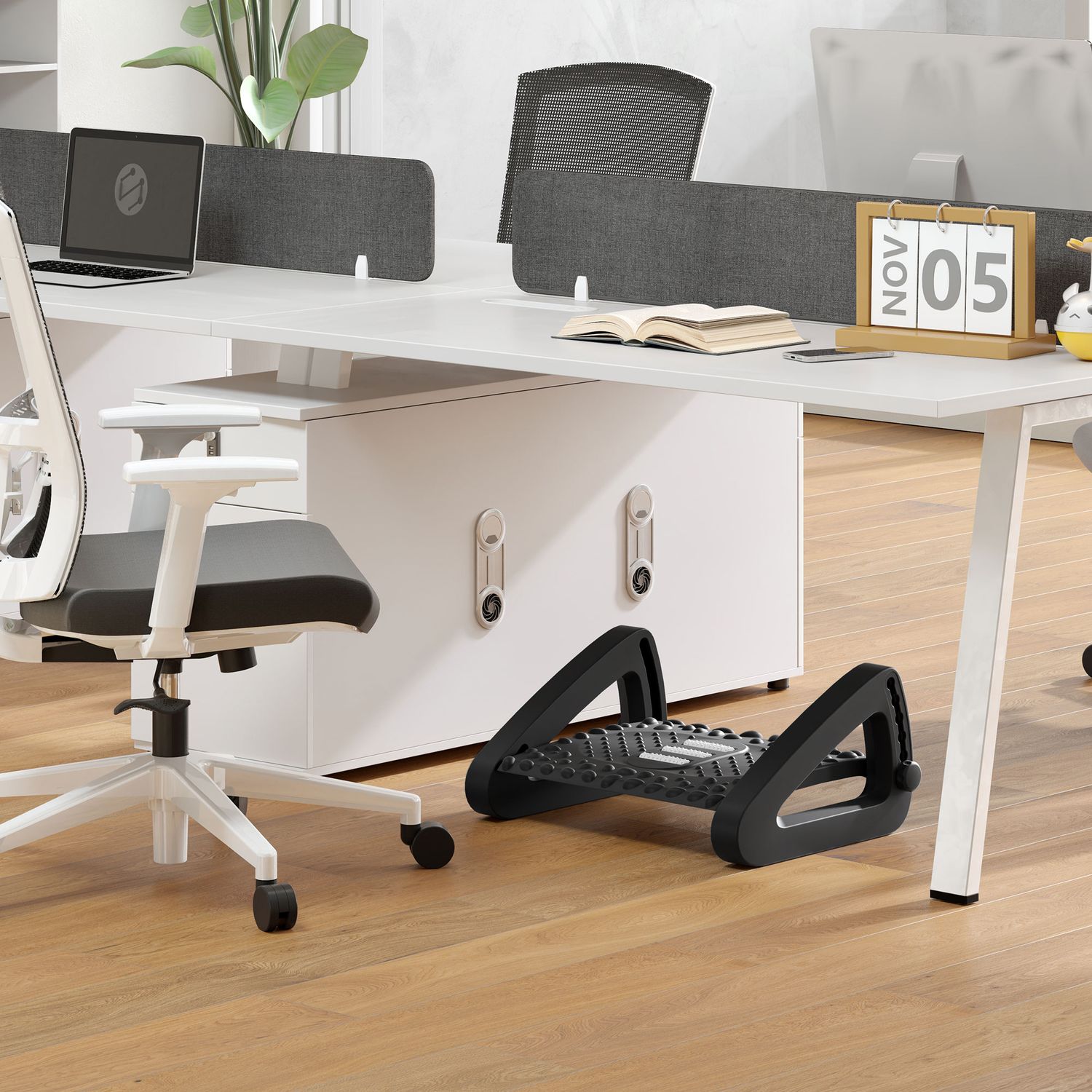 Justerbart ergonomiskt fotstöd med massageyta, svart