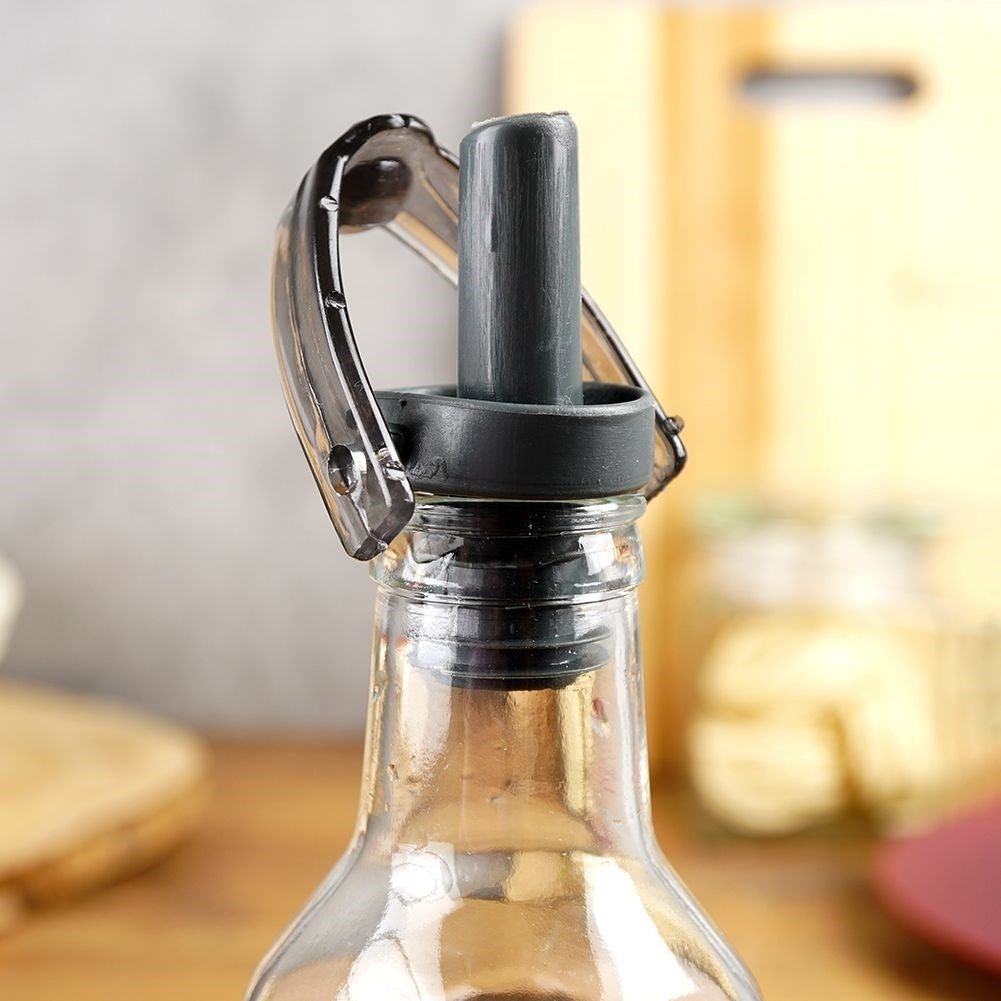Glasflaska för olja/vinäger med hällpip och förslutning