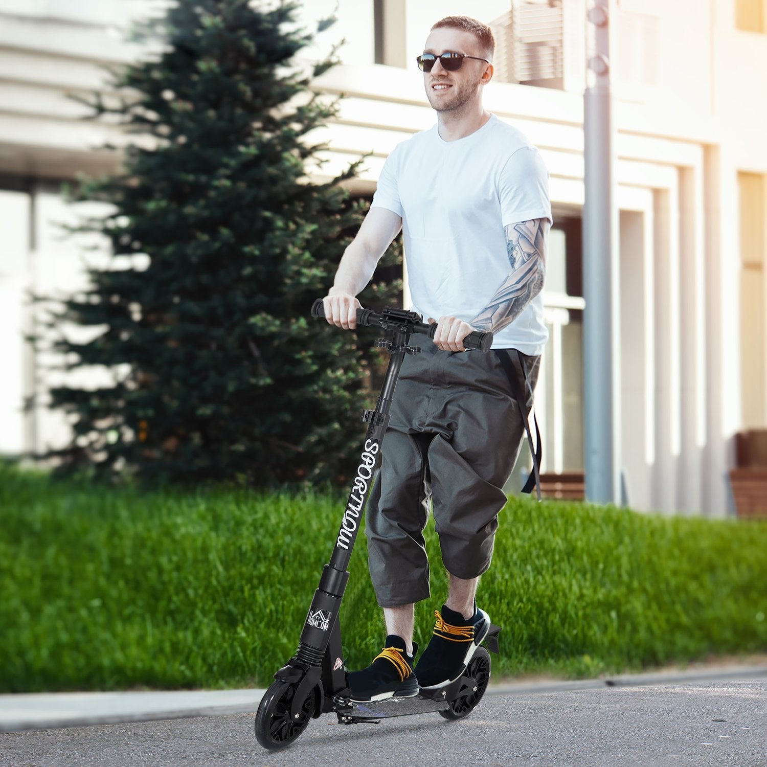 Höjdjusterbar sparkcykel med stötdämpningssystem