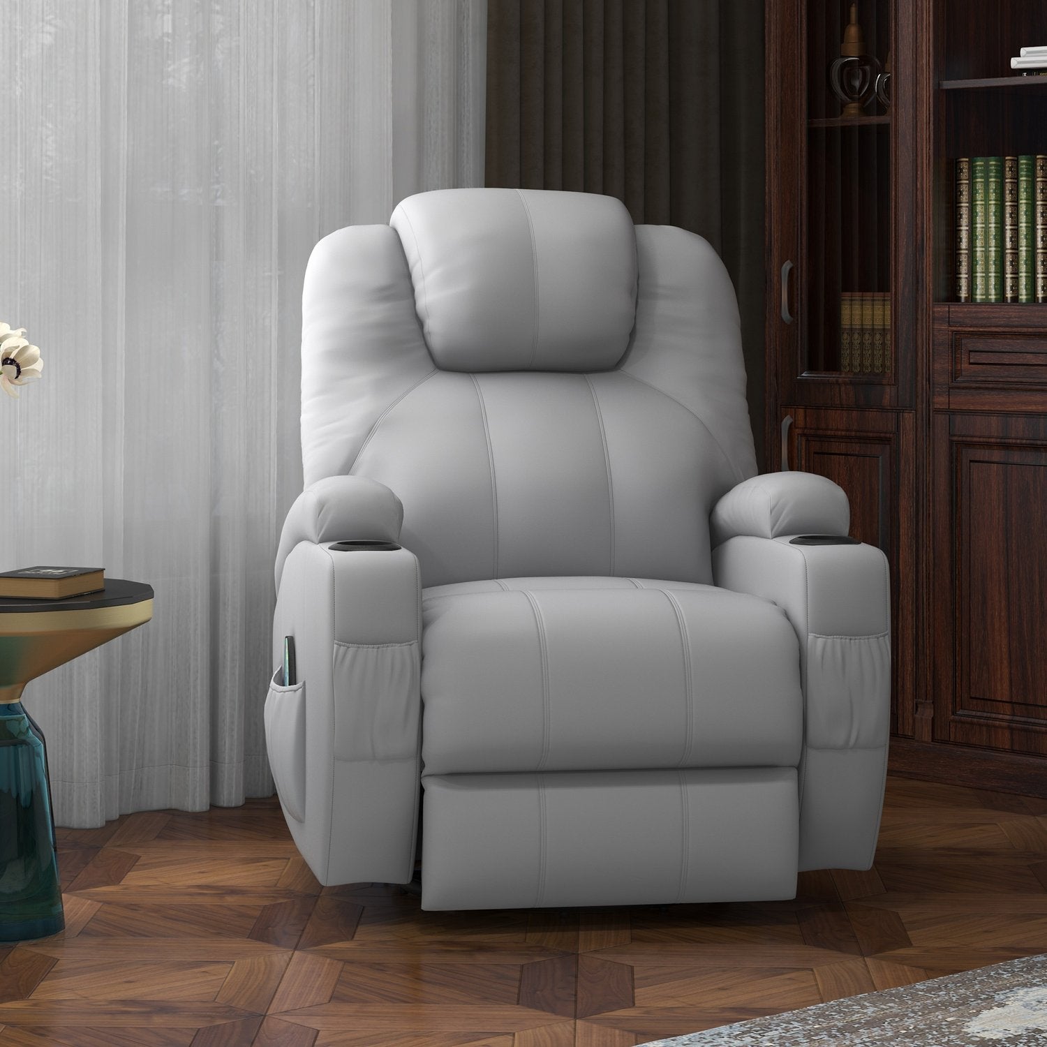 Grå massagestol i konstläder – Fåtölj med fjärrkontroll och vippfunktion