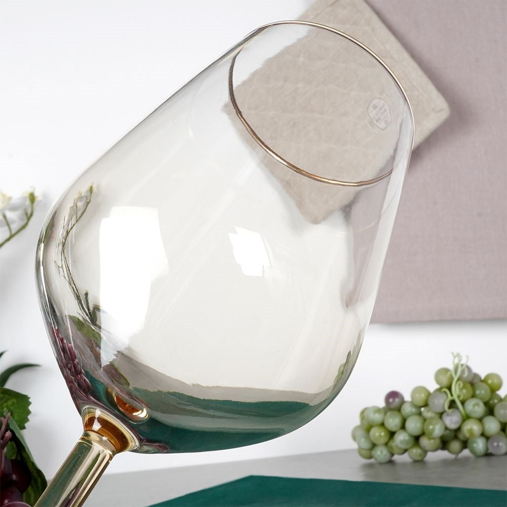 Elegant Vinglas i Bärnsten med Guldkant för Vitt & Rött Vin