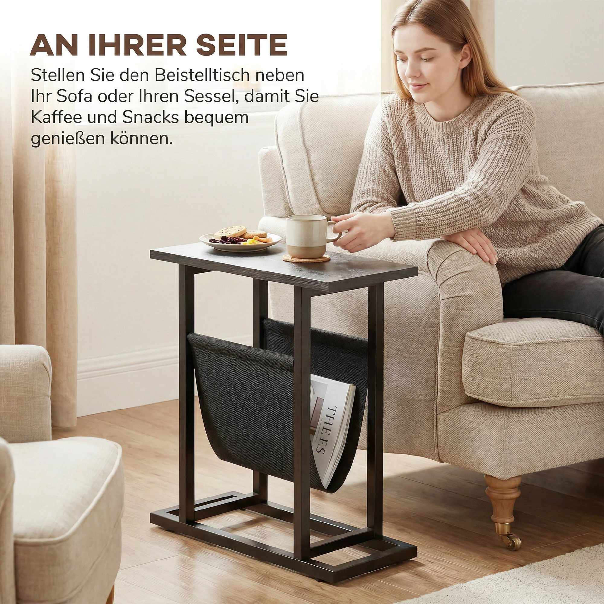 Kompakt svart sidobord med stålram och tygficka