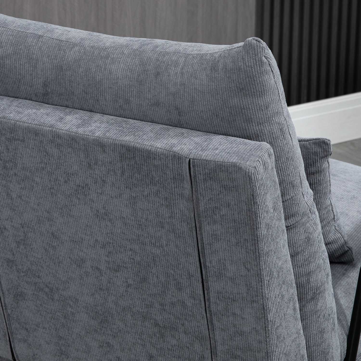 Liggande grå fåtölj med justerbart ryggstöd och ottoman