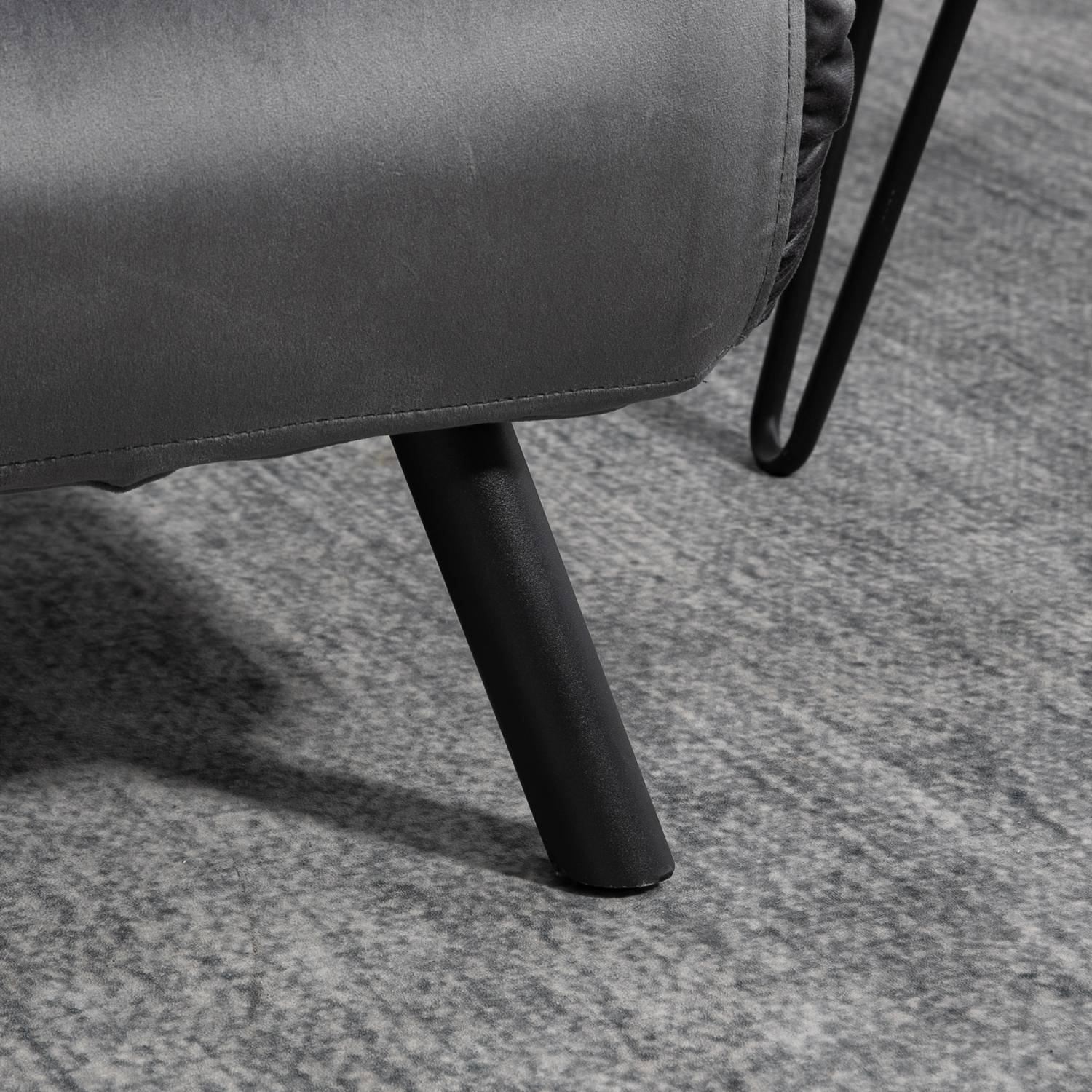 Mörkgrå sammetsbäddsoffa med förvaring och dyna