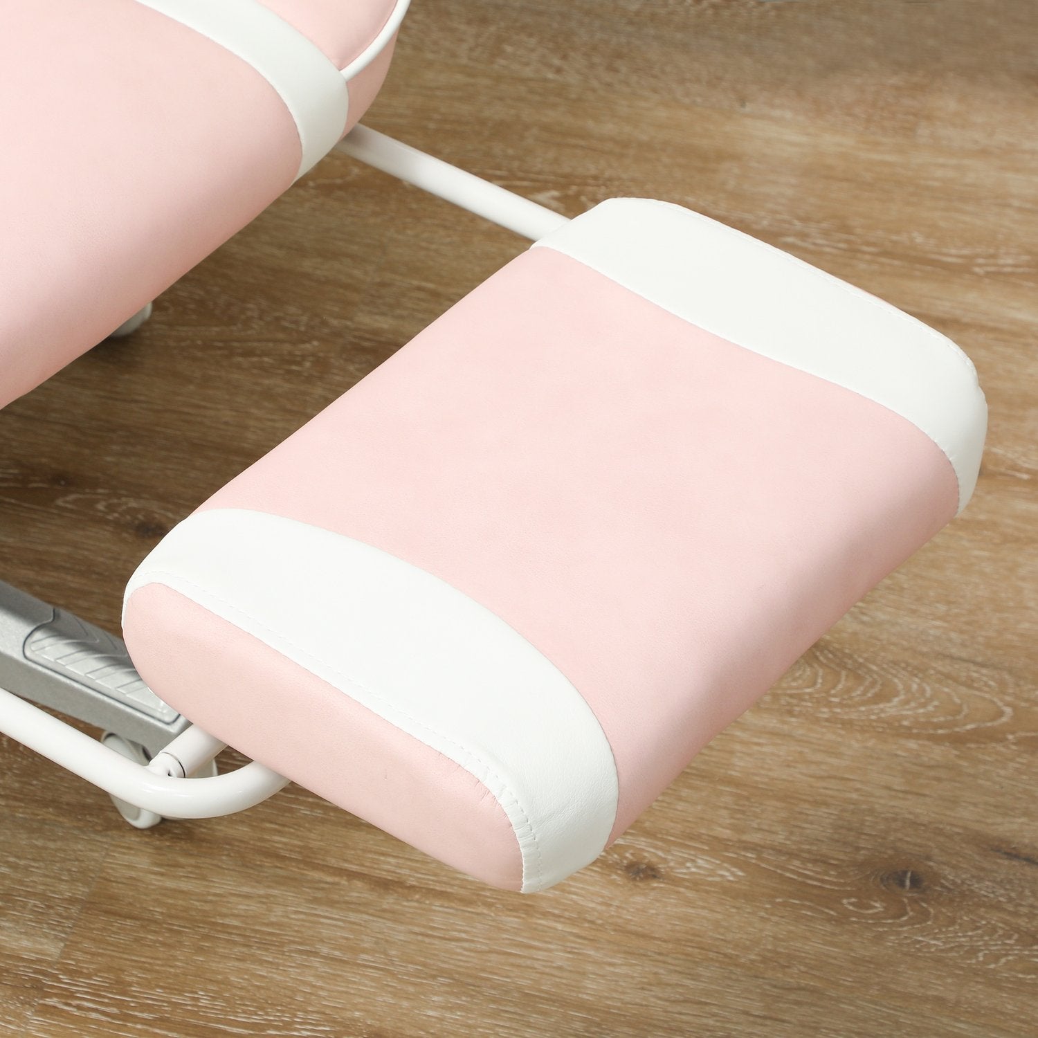 Rosa spelstol med fotstöd och justerbara kuddar