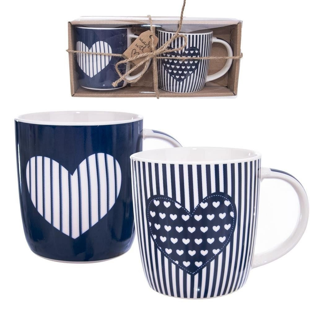 Set med 2 stilrena porslinsmuggar med unik design